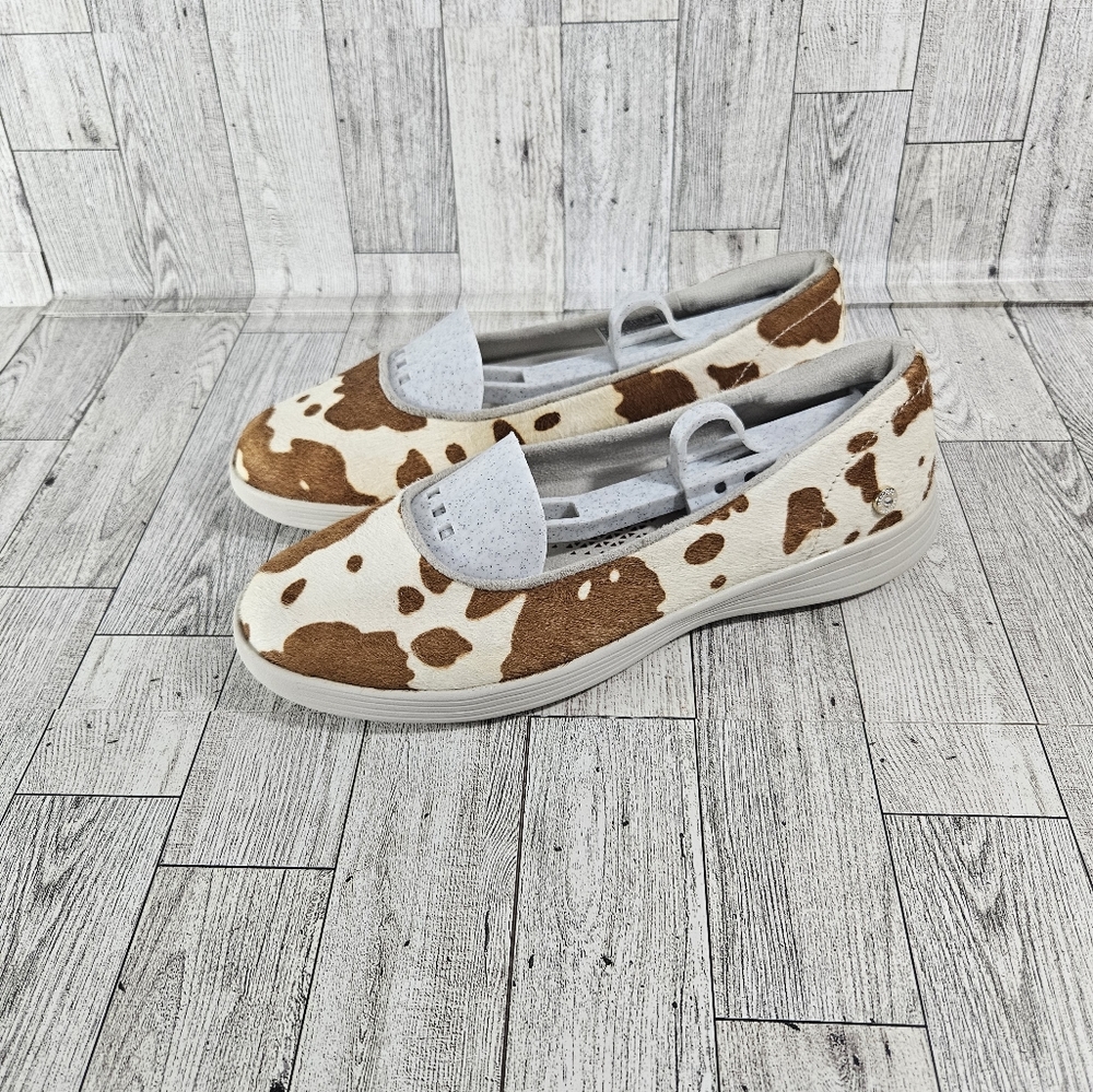 Skechers Cow Print Slip-On Flats in White and Brown